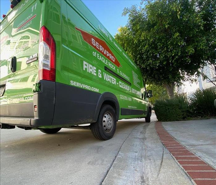 Dramatic angle of a green SERVPRO of Eagle Rock / South Glendale service van