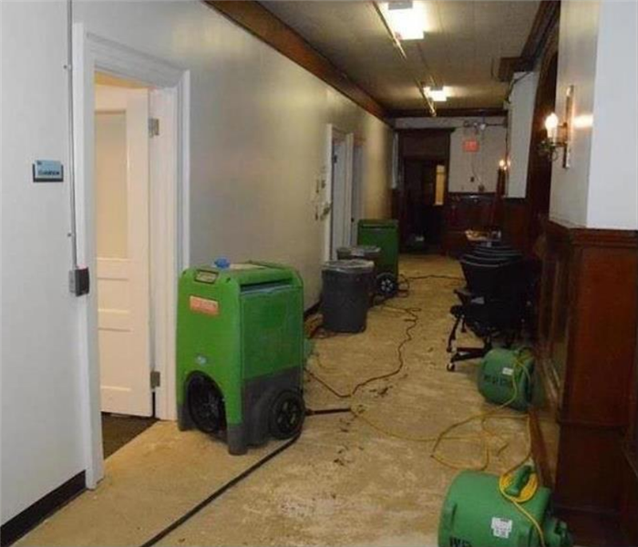 SERVPRO equipment in the hall of a commercial building